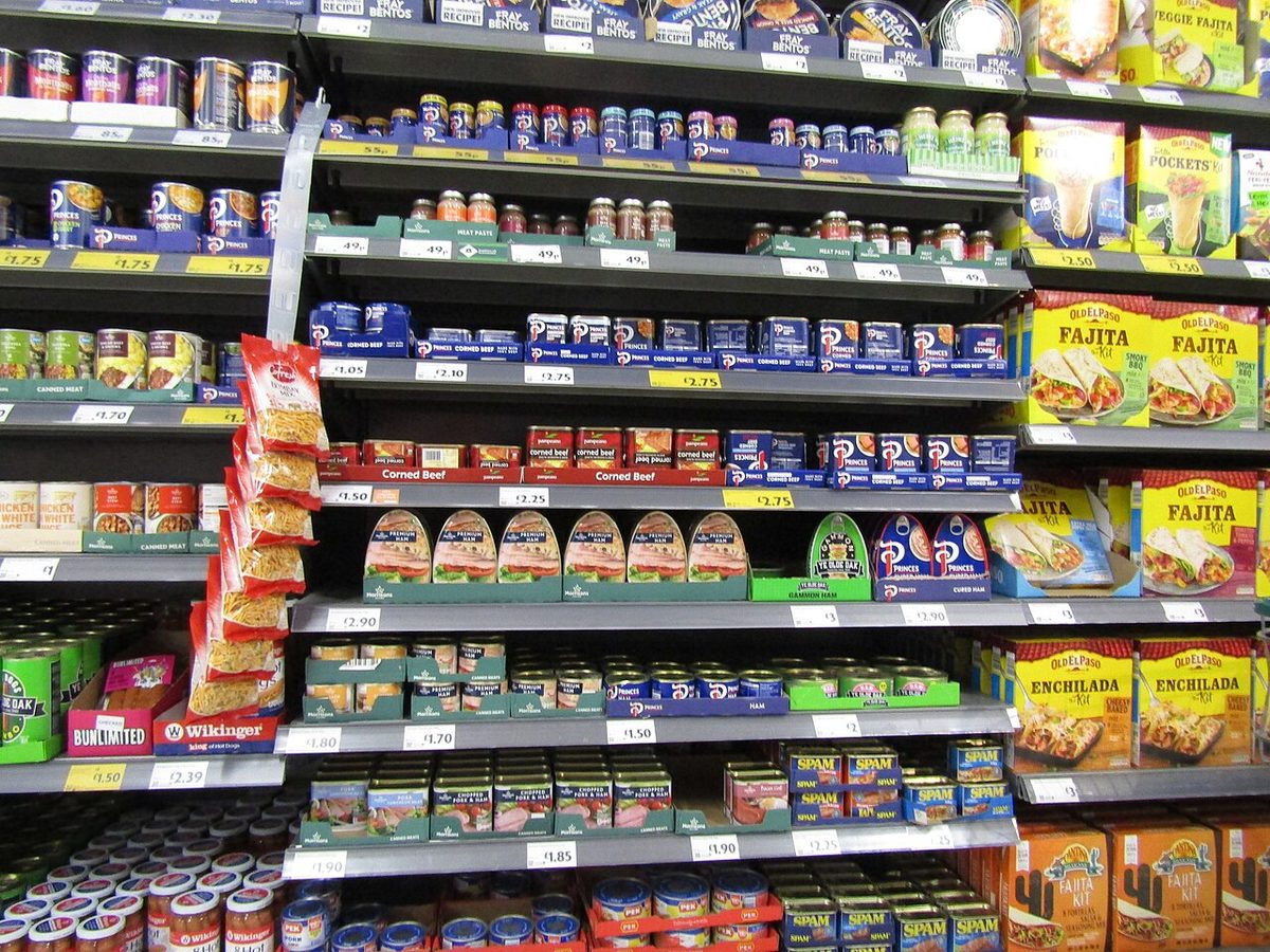 A display of Tin meat, ham and pies inside Morrisons supermarket located in the town of Cromer, Norfolk, England.